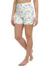 Front view of model in white high-waisted yoga shorts with colorful melting heart print