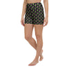 Front view of black high-waisted yoga shorts with bold neon rose floral print.