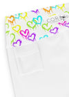 Close-up of small inside pocket in white yoga shorts with melting heart design, ideal for keys or small items