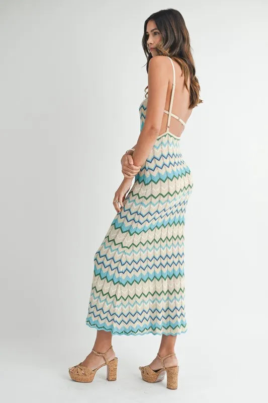  Side view of the Aqua Lightweight Pointelle Knit Maxi Dress emphasizing the flowing fabric and relaxed fit.