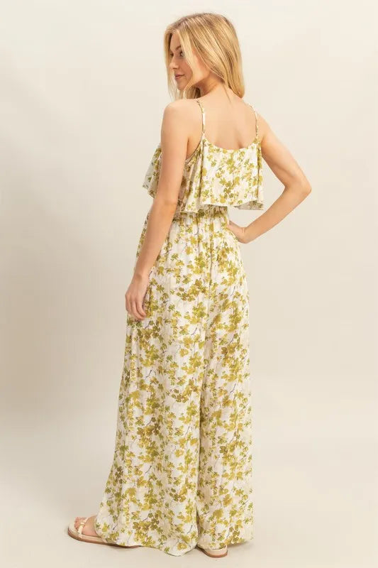 Rear view of the wide leg jumpsuit displaying the full-length design and smooth back finish, ideal for casual brunches or beach evenings.

