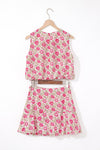 Back view emphasizing the skirt’s waistband and the tank top’s back design, both adorned with detailed floral motifs that give the outfit a cohesive and stylish finish.

