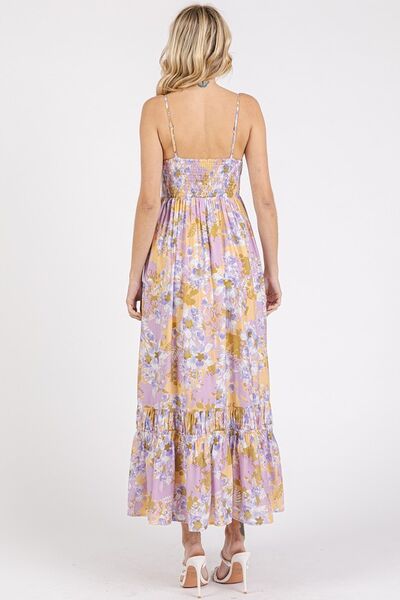A back view of the Lavender Floral Print Smocked Back Ruffled Hem Maxi Cami Dress, highlighting a beautifully tiered skirt, smocked back design, and a relaxed yet stylish fit.