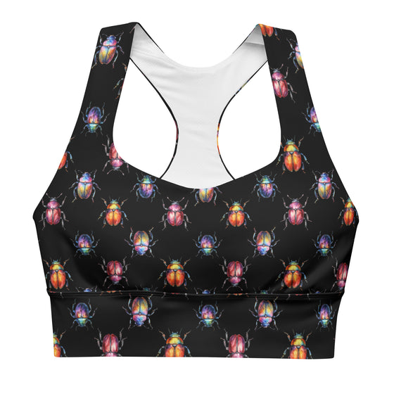 Closeup of Beetle Bug print on front of black high impact sports bra. Features removable padding, double-layered support, and a sleek longline silhouette.