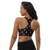 Back view of Beetle Bug print racerback sports bra in black. High support compression fabric with breathable longline fit, perfect for intense workouts.