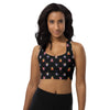 Model wearing Beetle Bug black high impact longline sports bra. Racerback design with artistic insect print, ideal for gym workouts and all-day support.