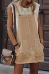 A versatile and fashionable overall dress in a soft beige hue, designed with a flattering square neckline and side buttons for added charm.