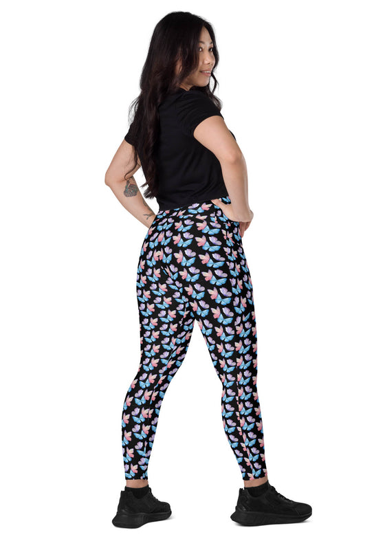 Back view of woman standing in Black Butterfly Dreams High-Waisted Leggings with Pockets. Stylish and flattering with butterfly accents, perfect for gym or casual wear.