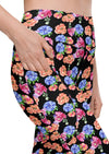 Close-up of Black Floral High Waisted Leggings with Pockets, showcasing elegant floral print and functional side pockets for added convenience during workouts or everyday use.