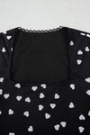 Closeup of the neckline from the front, showing the smooth trim finish, elegant curve of the neck seam, and how the mesh subtly softens into skin.

