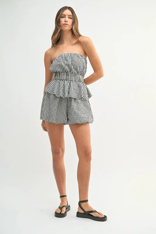 A styled front image showing the set paired with accessories, capturing a chic daytime outfit ideal for summer outings or casual events.

