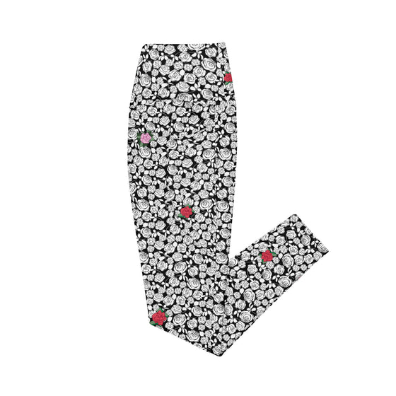 Folded Black & White Rosette High-Waisted Leggings with floral print. Perfect for gym, yoga, and casual wear. Convenient pockets for essentials.