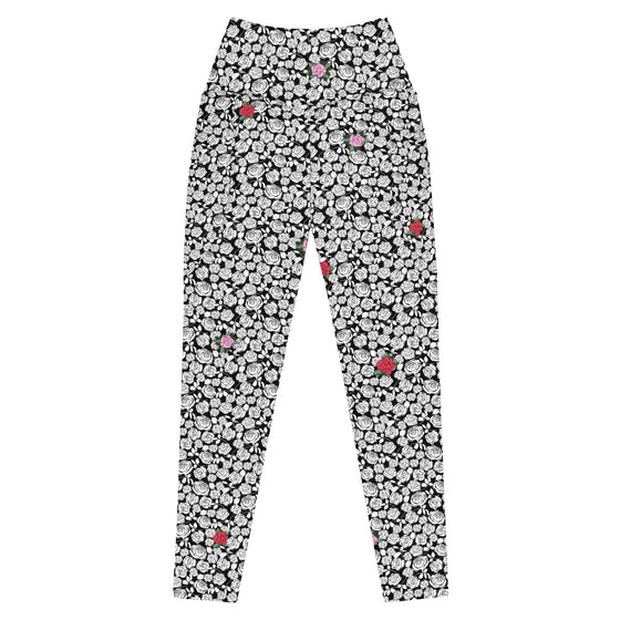 Black & White Rosette High-Waisted Leggings in front view, showing sleek floral print and functional side pockets for convenience and style.