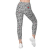 Model showing the back of Black & White Rosette High-Waisted Leggings with a floral print. High-rise fit, perfect for active wear and casual outings.