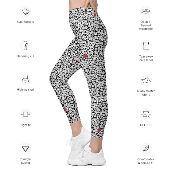 Model in Black & White Rosette High-Waisted Leggings showing floral design and side pockets. Perfect for workouts, yoga, and stylish everyday wear.