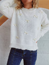 Front view of the Bow Trim Round Neck Long Sleeve Sweater showcasing its bow embellishments and cozy design.