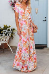  Elegant front view of the burnt coral maxi dress with soft floral prints, a breezy silhouette, and a casual yet stylish waist tie feature.

