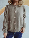 Front view of the Button Up Long Sleeve Cardigan featuring a buttoned closure and functional front pockets.