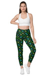 Model wearing Cactus Bloom Black High-Waisted Compression Leggings for women, featuring tummy control, a moisture-wicking fabric, and a bold cactus print.