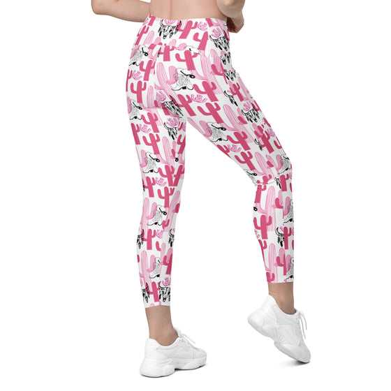 Back view of high waist Cactus Cowgirl leggings with bold pink cactus print. Gym leggings with pockets for women, perfect for fitness and casual wear.