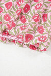 Detailed close-ups of the floral print fabric, showing the vibrant colors, intricate pattern, and breathable softness that provide comfort and style in warm weather conditions.

