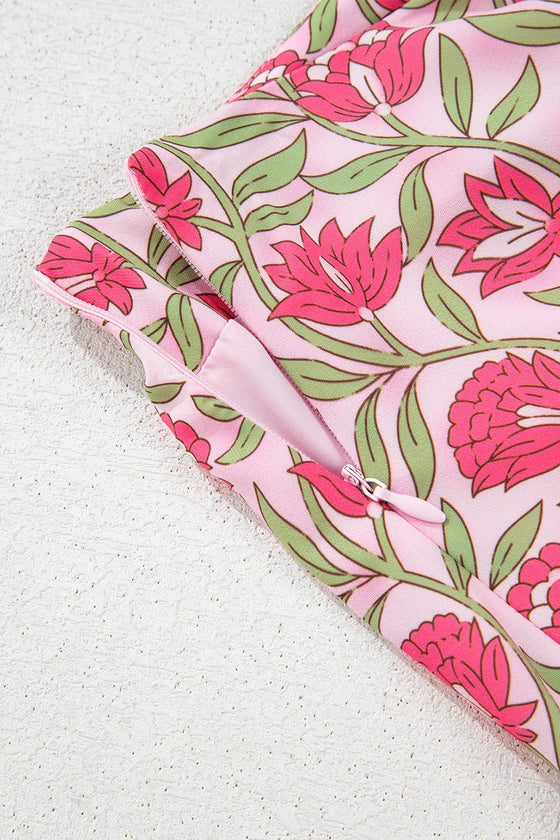 Detailed close-ups of fabric the floral print fabric, showing the vibrant colors, intricate pattern, and breathable softness that provide comfort and style in warm weather conditions.

