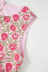 Detailed close-up of the tank’s sleeve edge, focusing on the fabric finish and how the floral pattern is vividly displayed on the soft material for added elegance.

