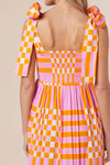 Back view of the Color Block Tie Shoulder Dress featuring a smocked bodice and breezy design.