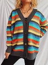 Close-up of a Contrast Stripes Button-Up Long Sleeve Cardigan with vibrant horizontal stripes in red, green, and beige tones, styled casually with black pants.