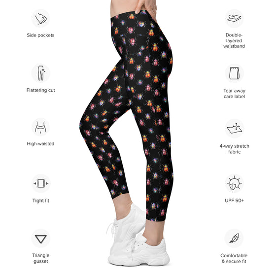 Details of Cori Michelle black leggings. Women's high waisted leggings with pockets and detailed beetle bug illustration.