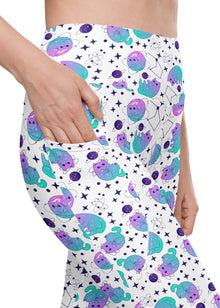  Closeup of Cosmic Cats White High-Waisted Leggings showing pocket design. Stylish and functional pockets for women’s yoga pants, perfect for workouts and everyday wear.