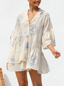  Front view of the Cream Button Detail Printed Mini Dress featuring its elegant button detailing and floral print.