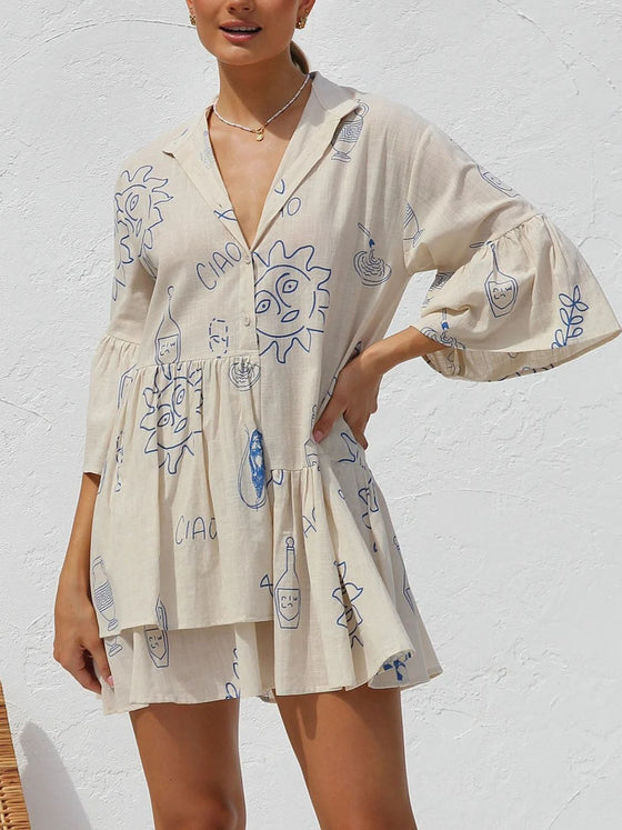 Another front view of the Cream Button Detail Printed Mini Dress, highlighting the flattering fit and unique button accents.