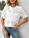 Feminine front look of white lace top with button detailing and intricate lace fabric, styled for brunch or casual wear.