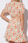 Back view of the Floral Cutout Short Puff Sleeve Dress, showing the overall floral pattern and mini length.