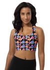 Woman wearing the Floral Print Black Medium Support Racerback Sports Bra. Stylish floral design on a black base, offering medium support and flexibility for workouts, yoga, and daily activities. Racerback design for freedom of movement.