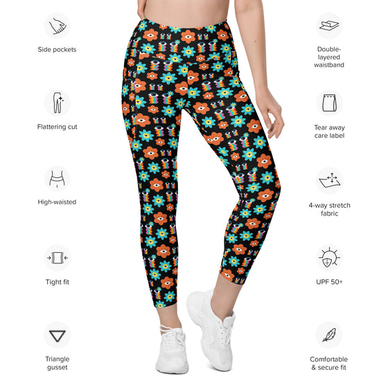 Floral Print Black Yoga Leggings with Pockets. Elegant floral design and high-waisted fit, perfect for yoga, workouts, and casual wear with convenient pockets for storage.