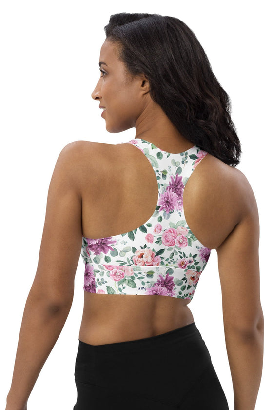 Back view of Floral Print White High Impact Sports Bra. Features adjustable straps and removable padding for a customized fit, with breathable mesh lining for added comfort during active workouts or daily activities.
