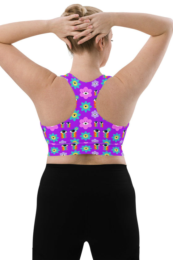 Back view of the Floral Rainbow Print Pink Racerback Longline Sports Bra in large size. The racerback style ensures superior movement and flexibility, with stylish floral patterns and high support for all activities.
