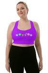 Front view of the Floral Rainbow Print Purple Racerback Longline Sports Bra in large size. Featuring a supportive racerback design and longline fit for added coverage, ideal for both workouts and casual outings.
