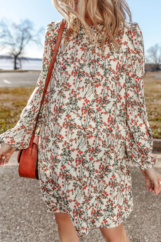 Front view of the Floral Mini Dress, displaying the round neckline and relaxed fit.