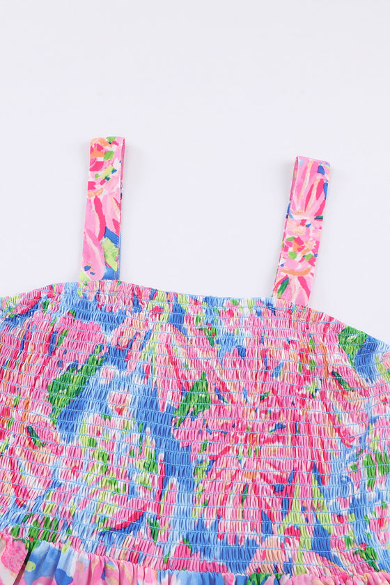 Close-up of the smocked bodice on the Floral Smocked Square Neck Jumpsuit, offering a comfortable, figure-flattering fit.