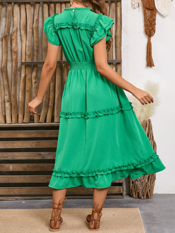 Back view of the Frill Cap Sleeve Midi Dress showing its flowy midi-length design and frill details.