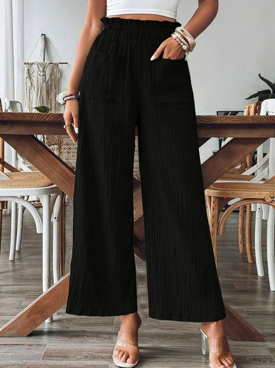 Front view of Frill Wide Leg Pants in beige with a wide-leg silhouette and functional side pockets.