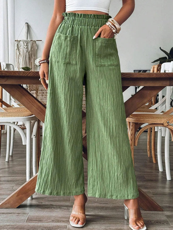 Front view of Frill Wide Leg Pants in beige with a wide-leg silhouette and functional side pockets.