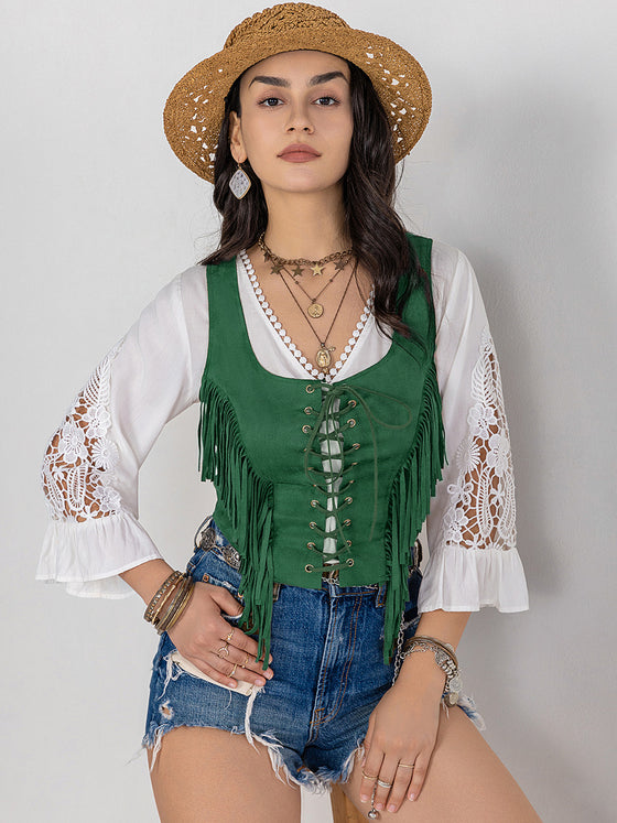 Model styling the Fringe Lace-Up Wide Strap Tank with layered jewelry and a straw hat for a chic boho look.
