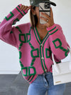 Front view of the Geometric Dropped Shoulder Button Down Cardigan in pink and green.