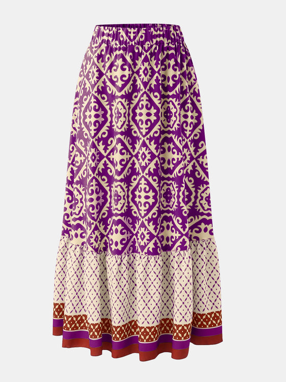 Front view of the Geometric Elastic Waist Maxi Skirt featuring a bold print and comfortable fit.