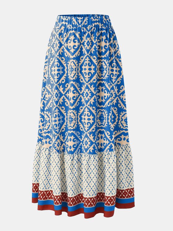 Front view of the Geometric Elastic Waist Maxi Skirt featuring a bold print and comfortable fit.