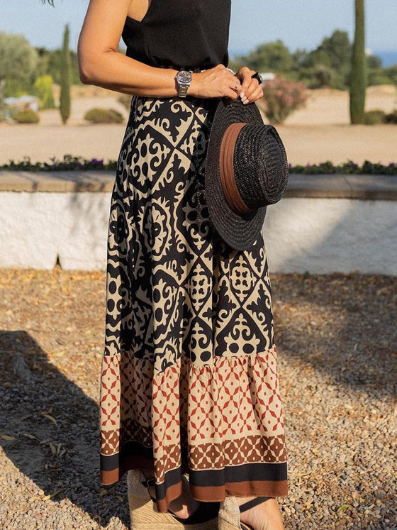 Front view of the Geometric Elastic Waist Maxi Skirt featuring a bold print and comfortable fit.